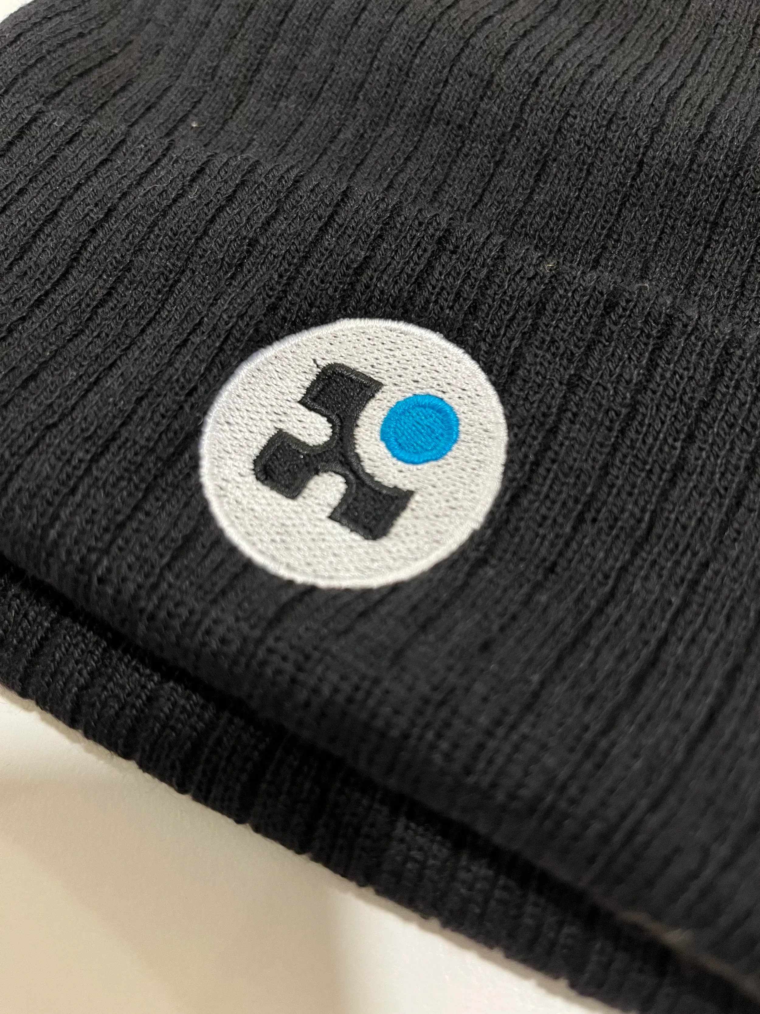 Printed brand asset showing logo and color palette in use